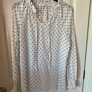 Polka dot top size 8-10. This item is a large. Worn once. Mint condition.